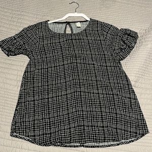 Black and white check FLAMINGO brand top.